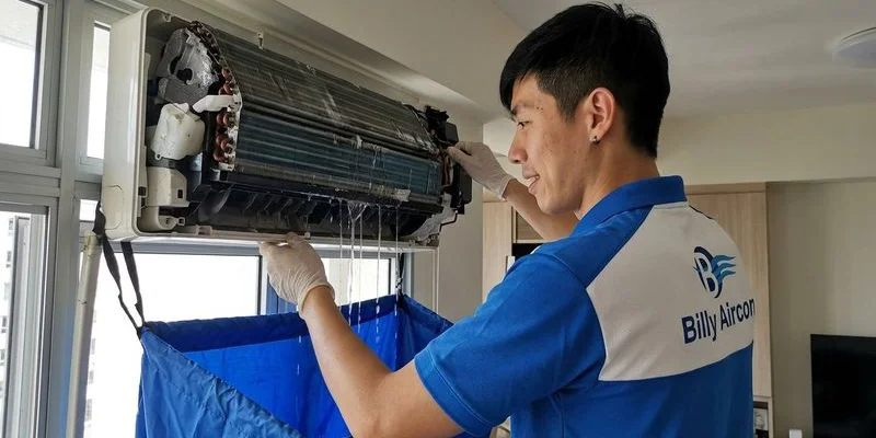 Chemical wash process showing foam spray on evaporator coil without dismantling