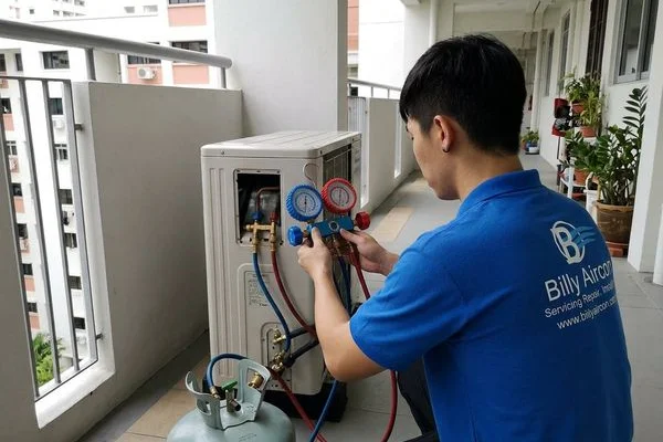 Refrigerant gauge manifold showing gas pressure readings during diagnostic