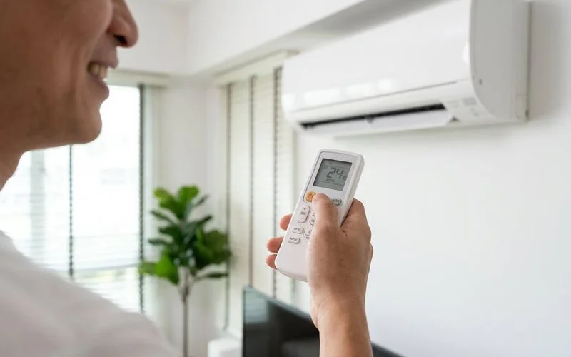 Bedroom with aircon set to optimal sleeping temperature in Singapore